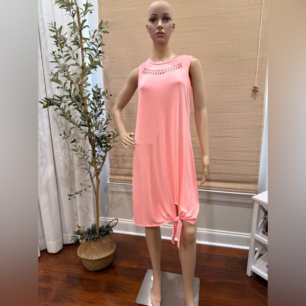 Version Neon Apricot Cover. Ties at hemline. Size M